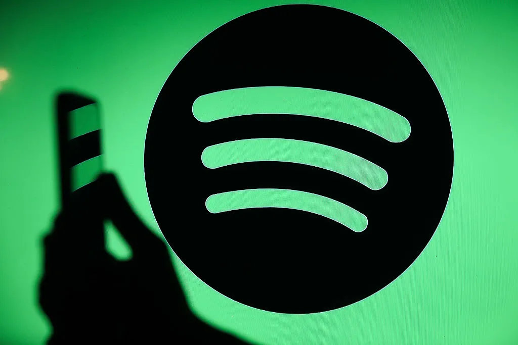 Home 1 spotify logo phone GettyImages 2236404299